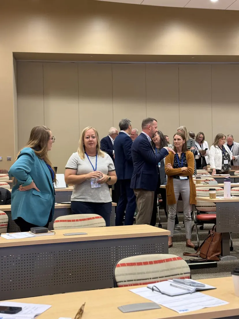 A group of attendees gathered between sessions